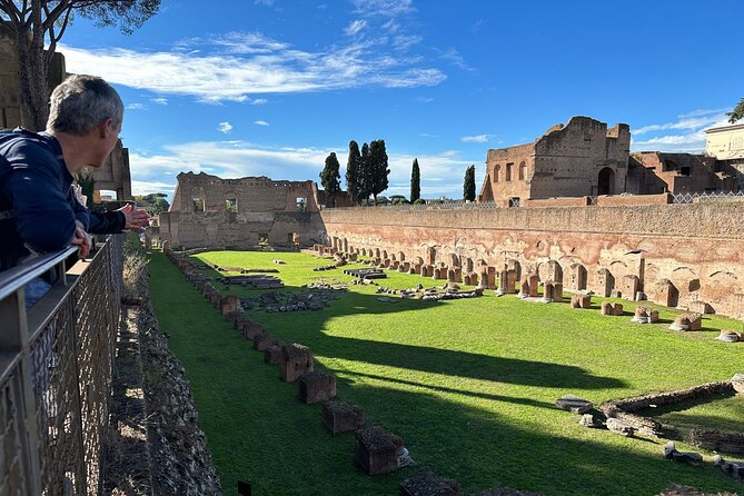 Ancient Rome Discovery: Colosseum, Forum, Palatine Guided Tour - Entering the Colosseum through the first tier