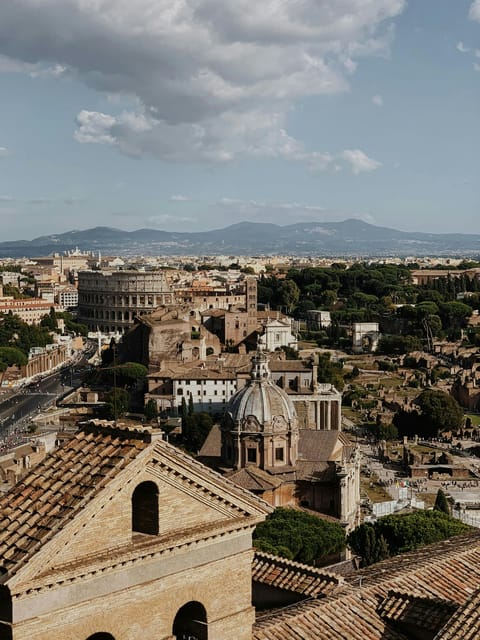Colosseum Entry with digital audioguide and arena option - Timing, heat, and closing hours