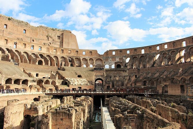 Colosseum, Forum, Palatine Hill with audio guide and Arena or Bus option - Collecting your ticket near the Colosseum