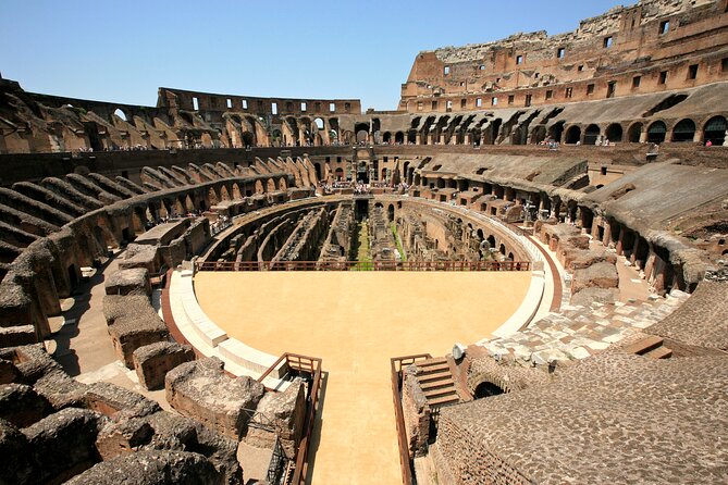 Colosseum Underground and Roman Forum: Small Group Exclusive Tour - Walking onto the Colosseum arena floor