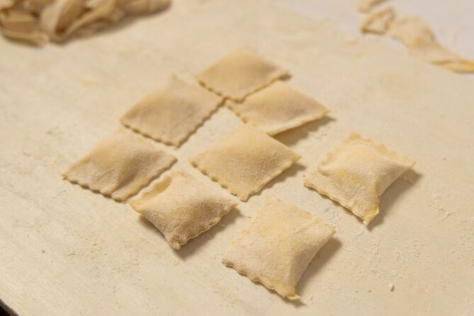 Fettuccine Ravioli and Tiramisu Cooking Class in Rome - The shared table is part of the lesson