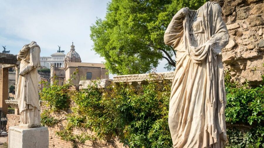 Palatine Hill and Roman Forum Tour with Fast-Track Entrance - Walking through the Roman Forum