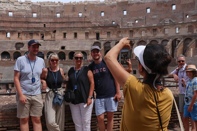 Roma: Colosseum, Forum, and Palatine Hill Local Guided Tour - Entering the Colosseum and looking beyond Gladiator