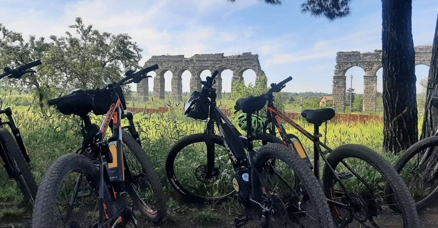 Rome: Appian Way Aqueducts Bike Tour (UPG Catacombs & Lunch) - Returning through Rome and passing the Baths of Caracalla