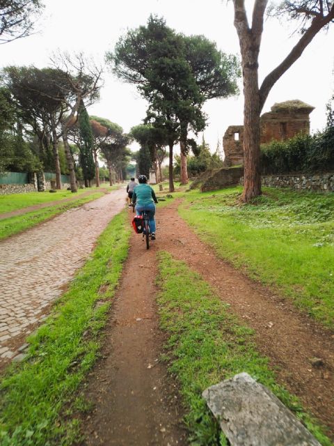 Rome: Appian Way & Catacomb Sunset E-bike Tour with Aperitif - Caffarella Park and the open-air aperitif