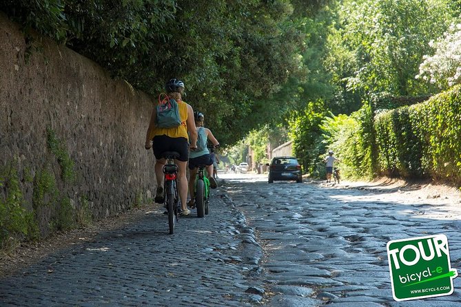 Rome:Appian Way E-bike Tour, Catacombs, Aqueducts & Transfer - Riding the ancient Appian Way