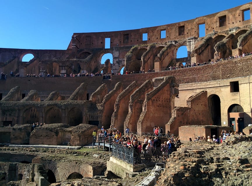Rome: Colosseum Experience with Audio Guide and Arena Option - Climbing Palatine Hill for the city views