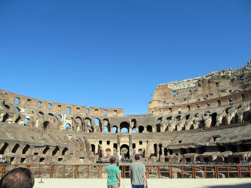 Rome: Colosseum Experience with Audio Guide and Arena Option - Finding Crown Tours above the Colosseo Metro Station