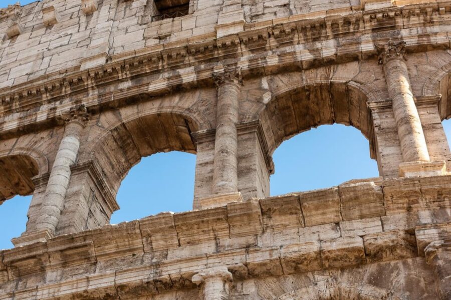 Rome: Colosseum Experience with Host and Audio Guide - Walking through the Roman Forum