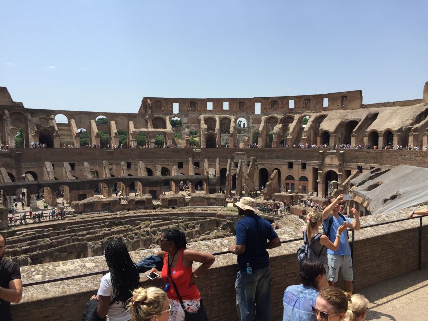Rome: Colosseum Express Guided Tour with Arena Access Option - What the guide adds inside the amphitheater