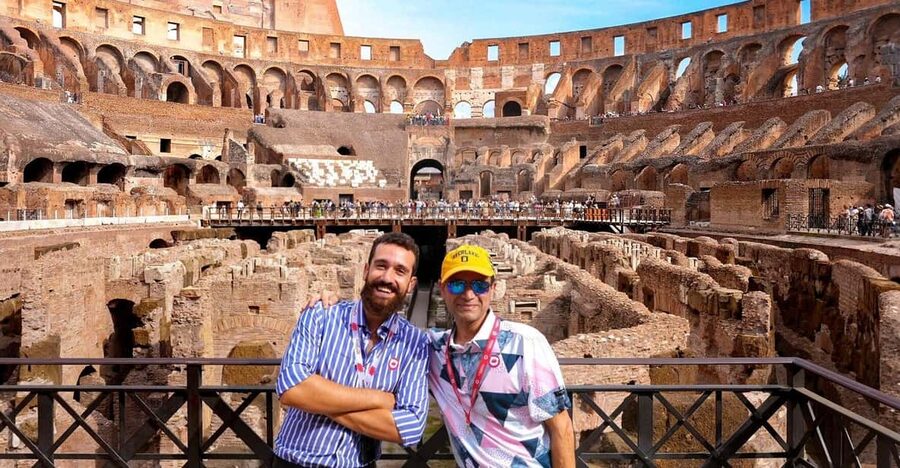 Rome: Colosseum, Forum, and Palatine Tour - Entering the Colosseum through the first and second tiers