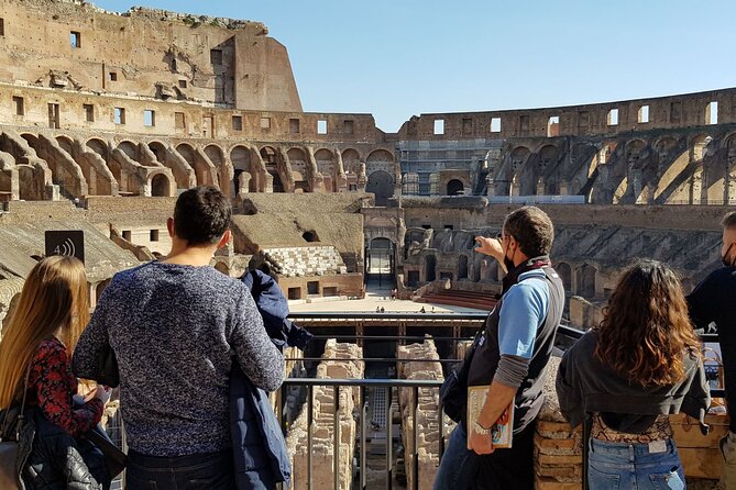 Rome: Colosseum, Palatine Hill and Roman Forum Guided Tour - Inside the amphitheater and onto the first floor