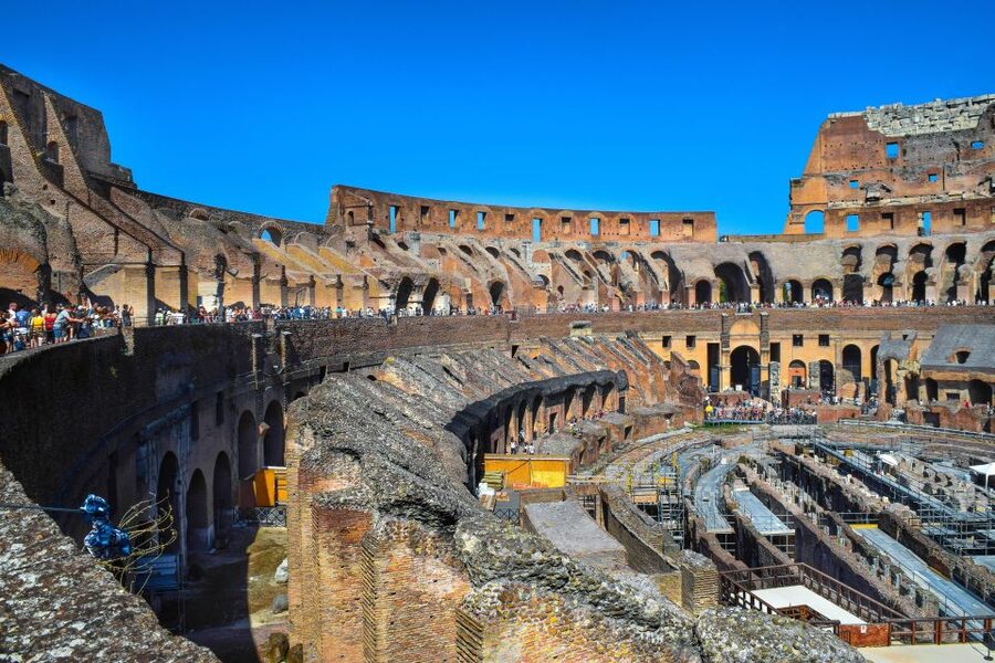Rome: Colosseum, Roman Forum, and Palatine Hill Ancient Tour - Walking through the Roman Forum