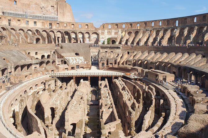 Rome: Colosseum, Roman Forum & Palatine Hill Experience - Walking through the Roman Forum