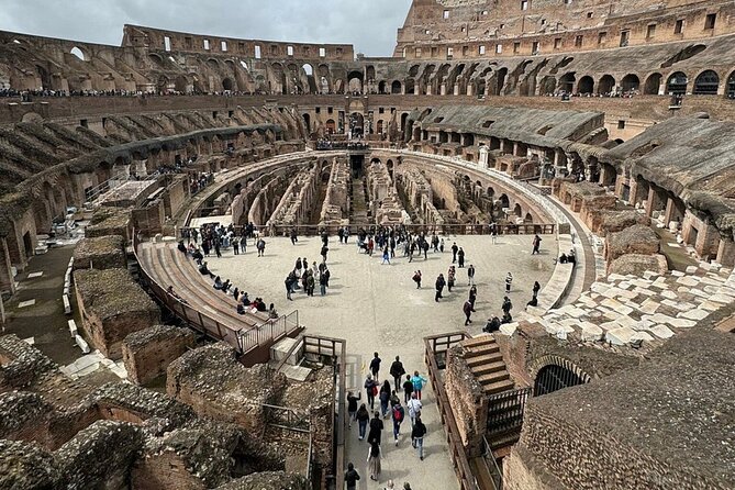 Rome: Colosseum, Roman Forum & Palatine Hill Visit + Audio Guide - Walking the Roman Forum after the arena