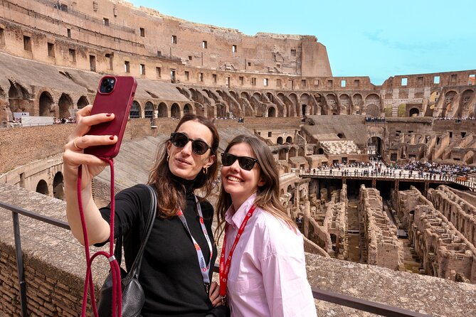 Rome: Colosseum with Roman Forum & Palatine Hill Guided Tour - Entering the Colosseum through the small-group entrance