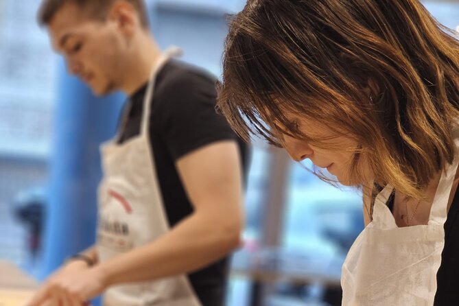 Rome: Hands-on Fettuccine, Ravioli & Tiramisu Cooking Class - Sitting down to eat what you made