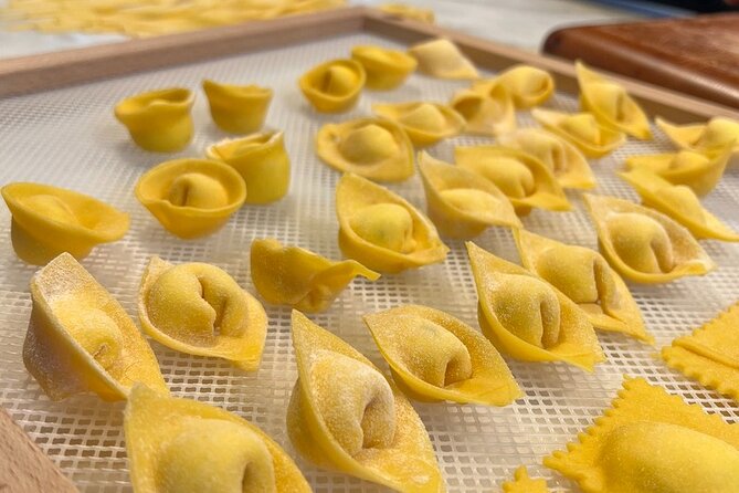 Rome Pasta Making Class with Italian Sauces and Wine Included - Making ravioli, fettuccine, and spaghetti alla chitarra