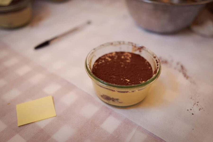 Rome: Pizza and Tiramisu Cooking Class in Piazza Navona - Sitting down to eat your own Roman dinner