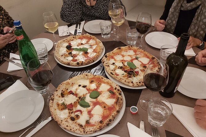 Rome: Pizza & Tiramisu Class with Free Flowing Fine Wine - Price, cancellation, and practical value