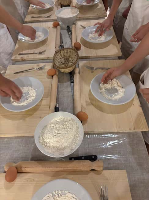 Rome: Rooftop Cooking Class with Wine Tasting near Vatican - Rolling fresh fettuccine from scratch