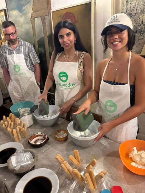Rome: Rooftop Cooking Class with Wine Tasting near Vatican - Sitting down to eat what you made