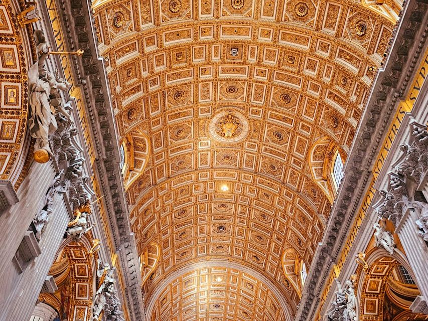 Rome: St. Peter's Basilica, Dome, and Vatican Grottoes Tour - Inside the basilica: marble, gold, and scale