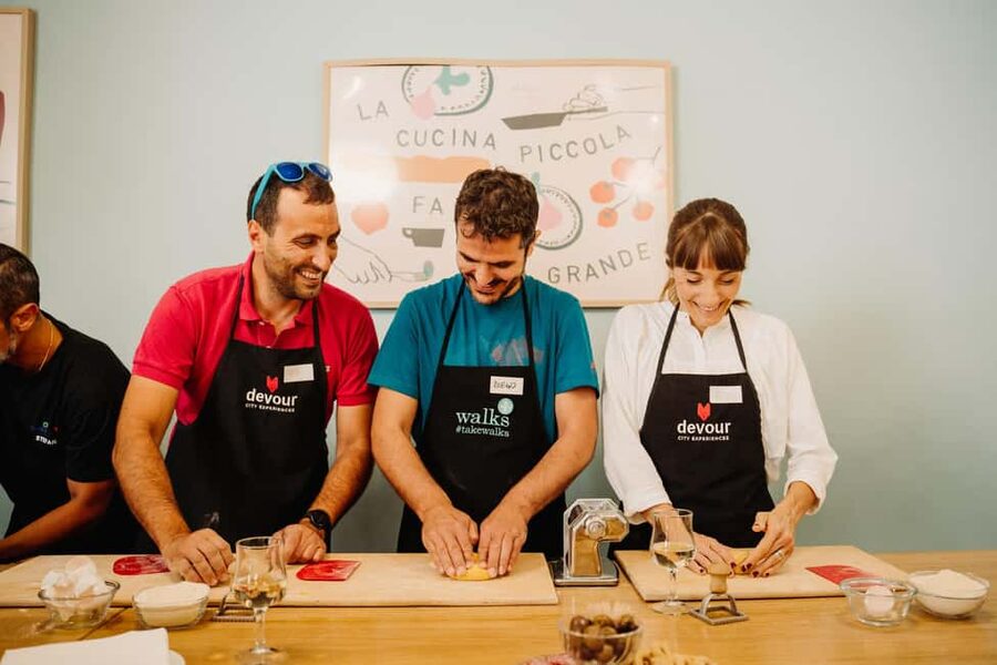 Rome: Traditional Pasta Making Class with Wine & Gelato - Sitting down to eat what you made