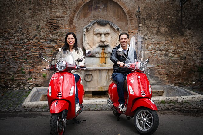 Rome Vespa Tour with Professional Photoshoot - Colosseum photo stop: Rome’s essential backdrop