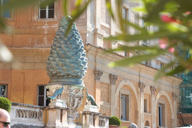 Sistine Chapel with St. Peter's Basilica & Dome Climb Guided Tour - A quick look at the Pinecone Courtyard