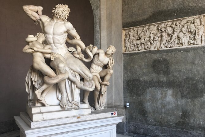 Skip the Line: Vatican & Sistine Chapel Ticket with Audio Guide - The Pinecone Courtyard and Sphere Within a Sphere