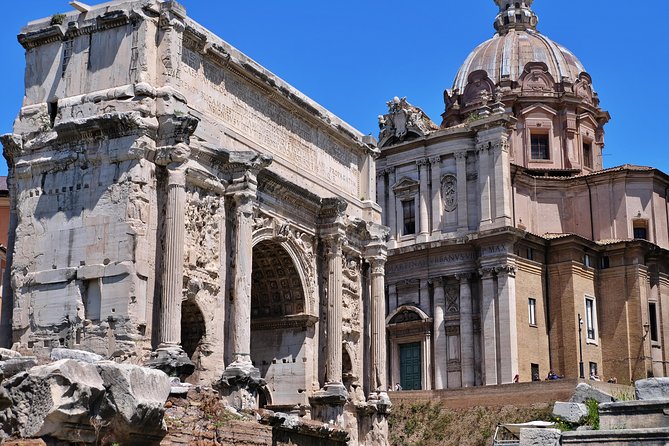 Small Group Colosseum, Roman Forum & Palatine Hill Tour - Walking through the Roman Forum