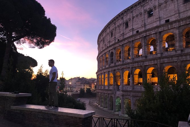 Sunrise in Rome: Small Group E-Bike tour with Italian Breakfast - Seeing the Colosseum from the saddle