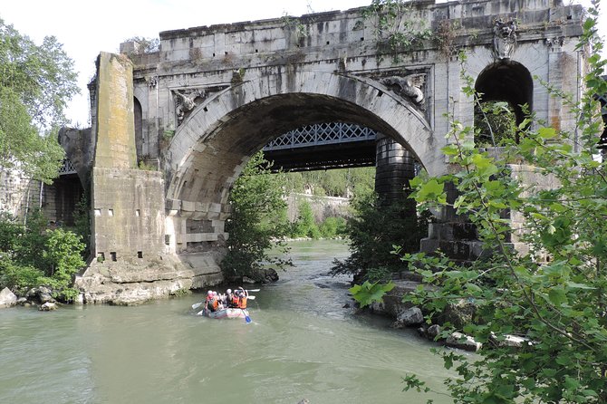 Urban Rafting on Rome's Tiber River - On the Tiber: calm water, city walls, and old bridges